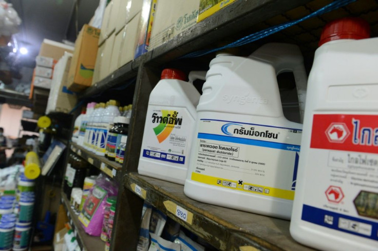 Containers of pesticide and weed killer containing paraquat and glyphosate on sale at a gardening shop in Bangkok