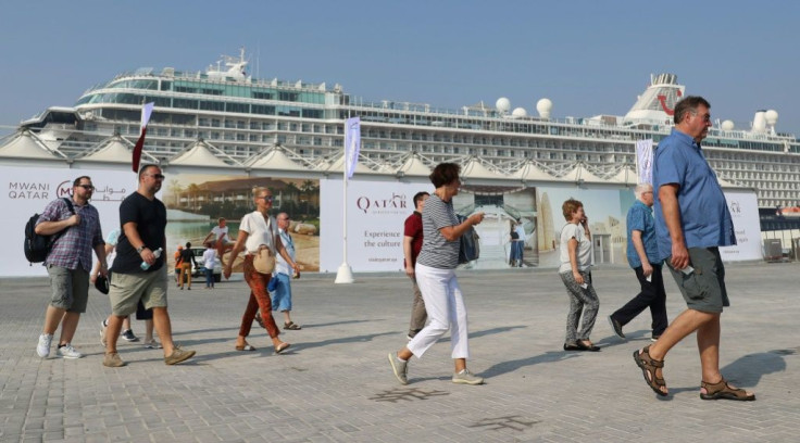 Tourists disembark at Doha Port as a new cruise season kicks off with the launch of a new temporary passenger terminal as Qatar works to increase the number of cruise ships making calls in the Gulf state