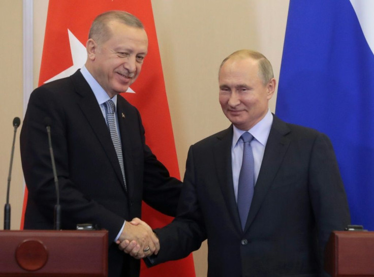Turkey's Recep Tayyip Erdogan (L) hailed "a historic agreement" on dealing with the Kurds in Syria following talks with Russia's Vladimir Putin at the Russian Black Sea resort of Sochi