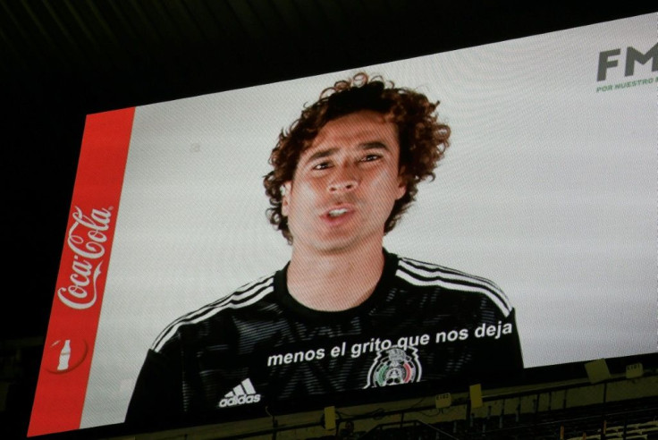 Mexican goalkeeper Guillermo Ochoa speaks out against homophobic chants in a message screened at the Azteca Stadium in Mexico City on October 15, 2019