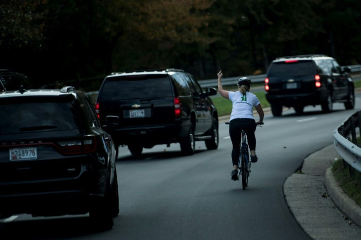 This photo from October 2017 shows Juli Briskman flipping off Donald Trump's presidential motorcade