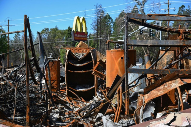 Barely 4,000 residents now live in Paradise, whose McDonald's, pictured October 1, still remains in rubble