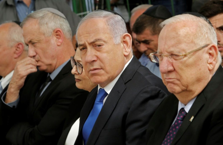 Netanyahu (C) gave up trying to form a government on Wednesday, with Rivlin (R) passing the baton to Gantz (L), whose party won the most seats in September 17 elections