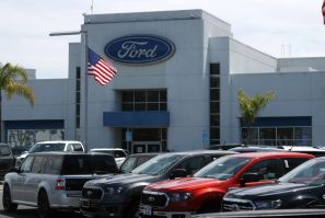 Ford reported lower quarter and slashed its full-year forecast, citing increased incentive spending in North America and lower sales in China