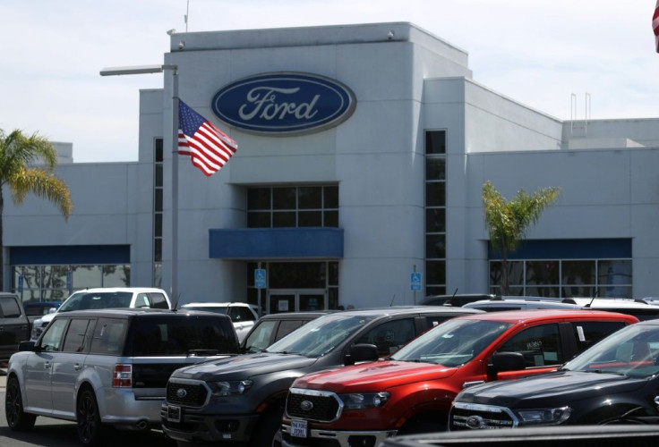 Ford reported lower quarter and slashed its full-year forecast, citing increased incentive spending in North America and lower sales in China