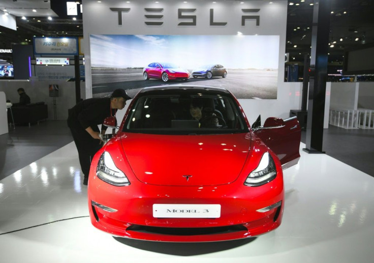 Electric carmaker Tesla said it boosted deliveries of its most affordable vehicle, the Model 3, as it delivered a surprise profit in the past quarter