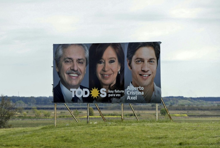 A campaign sign for presidential candidate Alberto Fernandez (L), his runningmate Cristina Kirchner (C) and the candidate for Buenos Aires governor Axel Kicillof, is seen near San Pedro