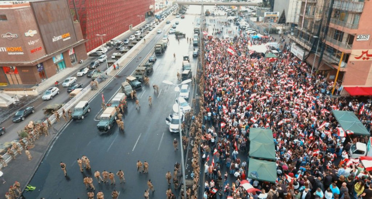 Protesters have cut major highways across Lebanon, crippling the capital Beirut and other cities