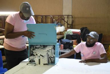 Time to count: Polling officers check ballots in a Gaborone constituency. The vote marks the first time that the 53-year dominance of Botswana Democratic Party is under threat