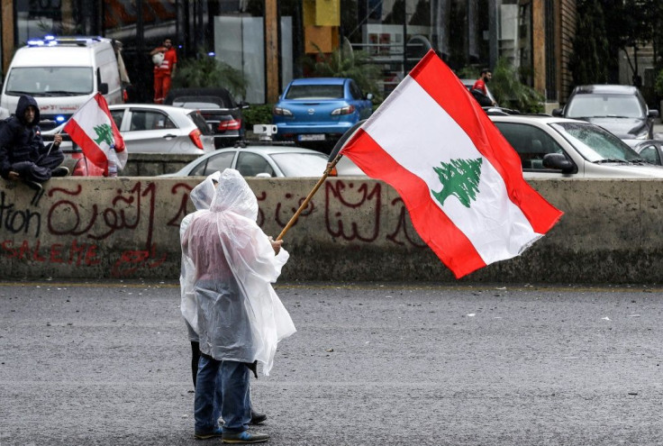 Protesters faced heavy rain as they demonstrated for an eight day on Thursday