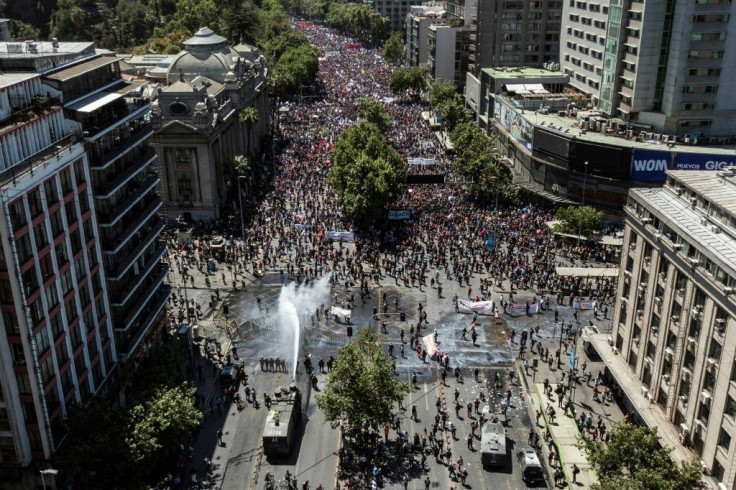 Mass protests in Santiago, Chile raised questions about an upcoming Asia Pacific Economic Cooperation Summit, but the government says it will be held on schedule November 16-17