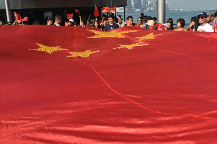 A pro-Beijing crowd rallies behind the Chinese flag in Hong Kong in October 2019