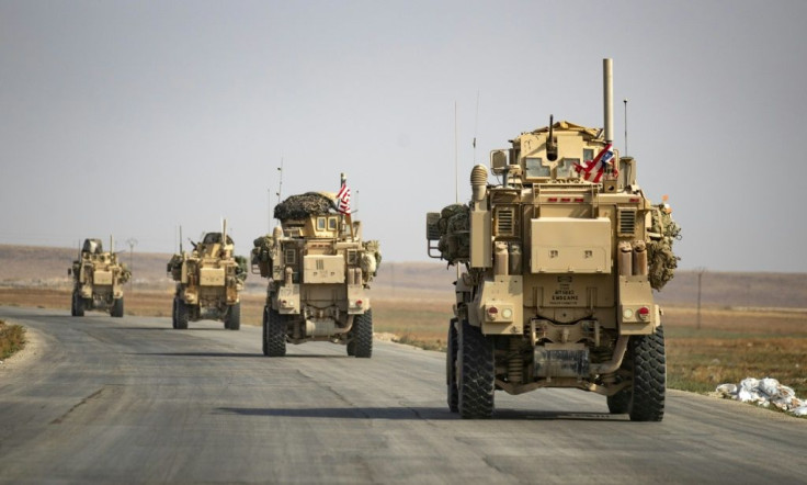 US military vehicles in northern Syria after US forces pulled out of their base in Tal Tamr on October 20