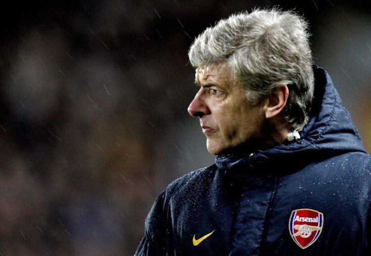 Wenger says that he misses management -- even in freezing, rainy nights in northern England