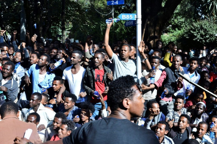 Supporters of Jawar Mohammed, a member of the Oromo ethnic group who has been a critic of Prime Minister Abiy Ahmed, gathered outside his home in Addis Ababa on Thursday after he accused security forces of trying to orchestrate an attack on him
