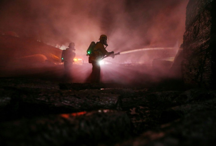 California's Tick fire broke out early Thursday afternoon, burning homes and structures and forcing the closure of a major highway