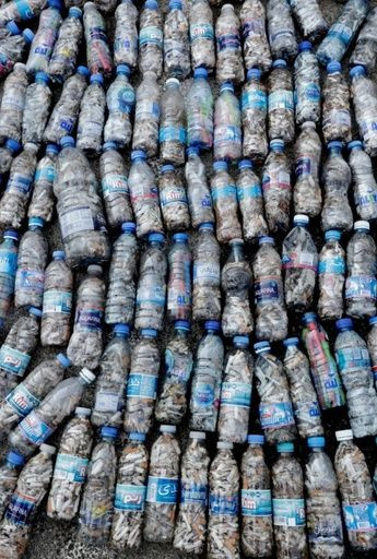 Each morning, Lebanese volunteers have been clearing up the plastic bottles, cigarette ends and other rubbish discarded during their nightly protest raves