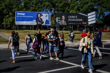 Anti-racism activist Joacine Katar Moreira, seen on the billboard on the right, is the best-known of the three new lawmakers