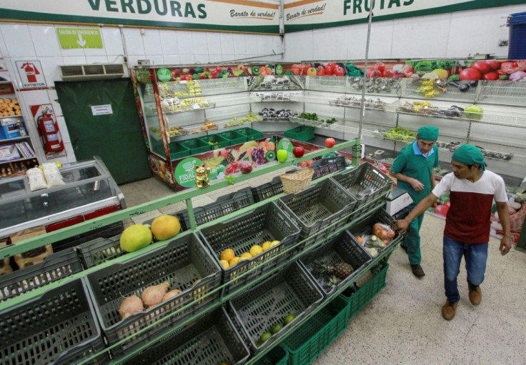 Workers of a supermarket show the empty crates on the third day of general strike after the election results were revealed by the Electoral Supreme Court in Santa Cruz, Bolivia on October 25, 2019