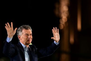 Argentina's President Mauricio Macri waves at supporters during the closing rally of his campaign in Cordoba, Argentina on October 24