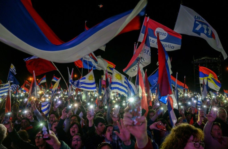 Ruling Broad Front supporters rally in Montevideo ahead of Sunday's vote where presidential candidate Daniel Martinez is expected to come top, but not claim an outright victory