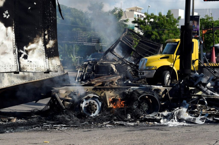 Burned vehicles simmer after the violence in Culiacan