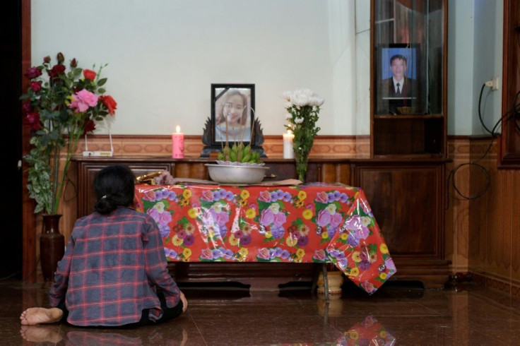 A portrait of Bui Thi Nhung (C) is kept on a prayer altar at her house in Vietnam. Nhung's family fear she could be among the 39 people found dead in a truck near London