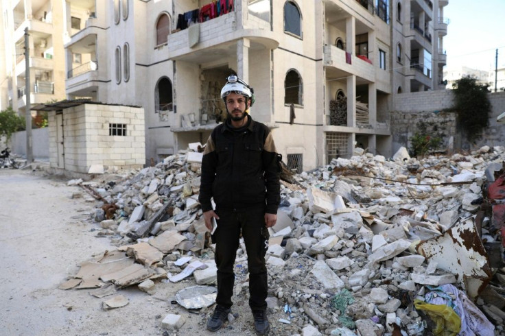 A member of the Syrian civil defence (also known as the "White Helmets") holds his smartphone in in the rebel-held northern countryside of Idlib. WhatsApp is a useful means of communication among rescue teams in Syria.