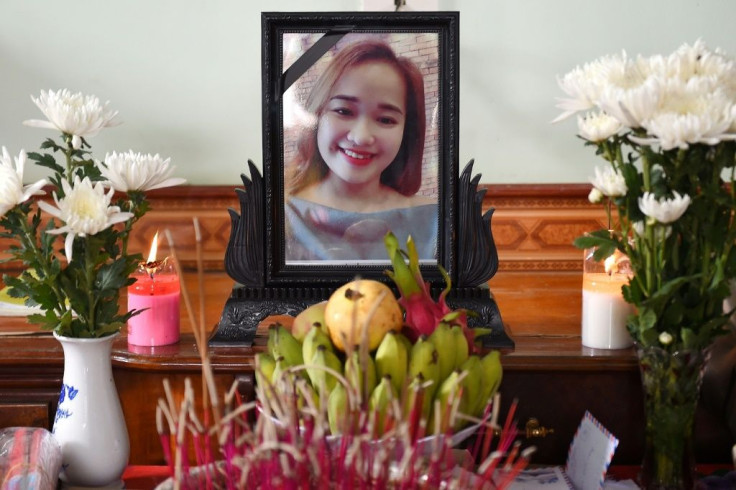 A portrait of Bui Thi Nhung, feared among the 39 people found dead in a truck in Britain, is displayed on an a makeshift altar at her home in Vietnam's Nghe An province