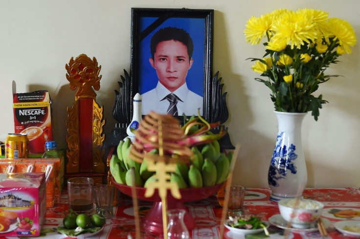 A portrait of 30-year old Le Van Ha is displayed at his home