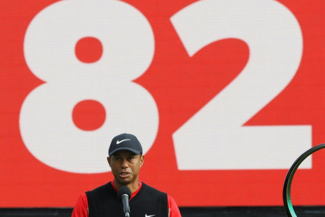 Tiger Woods beneath a giant "82" after winning the Zozo Championship in Japan and tying Sam Snead's all-time record