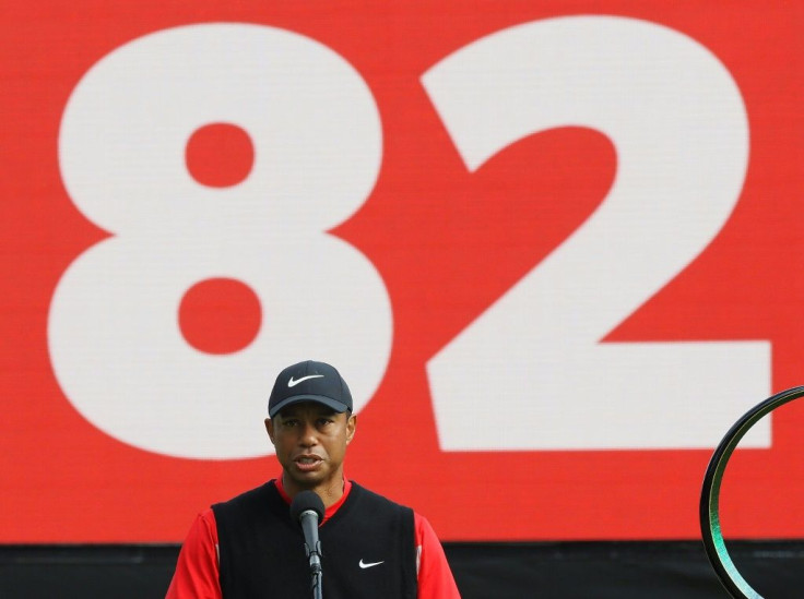 Tiger Woods beneath a giant "82" after winning the Zozo Championship in Japan and tying Sam Snead's all-time record