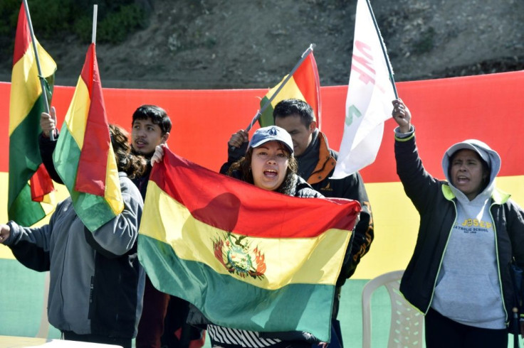 Protesters block a street in La Paz as part of opposition demonstrations against President Evo Morales's disputed reelection