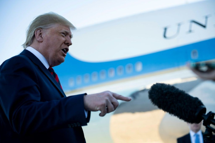 US President Donald Trump speaks to the press before boarding Air Force One at Andrews Air Force Base October 28, 2019, in Maryland en route to Chicago.