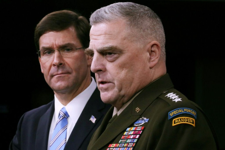 US Defense Secretary Mark Esper (L) and Chairman of the Joint Chiefs of Staff Gen. Mark Milley discuss the raid that killed Islamic State group head Abu Bakr al-Baghdadi