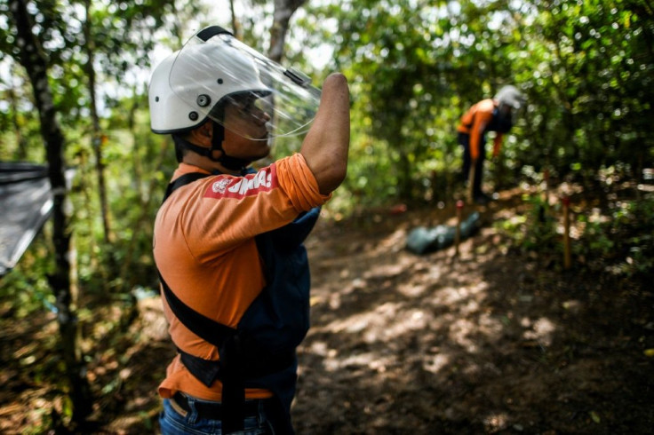 Former FARC guerrilla Edwin Correa -- who lost his hands in a grenade explosion -- is being trained to remove the mines that he once helped to plant in the Colombian countryside