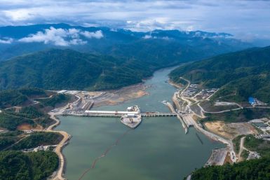 An undated CK Power-issued photo shows shows the Xayaburi dam hydro project on a swollen Mekong river in Laos, but independent images taken downstream paint a different picture