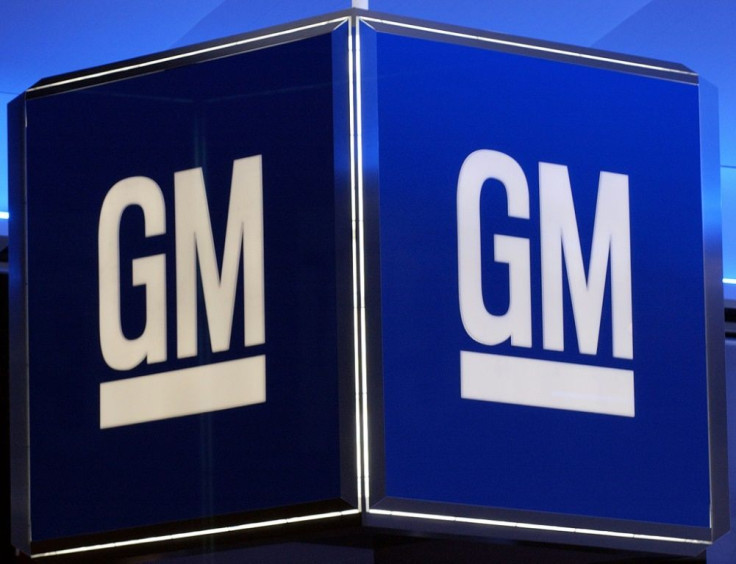 General Motors reported better-than-expected earnings on strong auto sales, but trimmed its full-year forecast due to the hit to the bottom line from the lengthy strike that ended last week