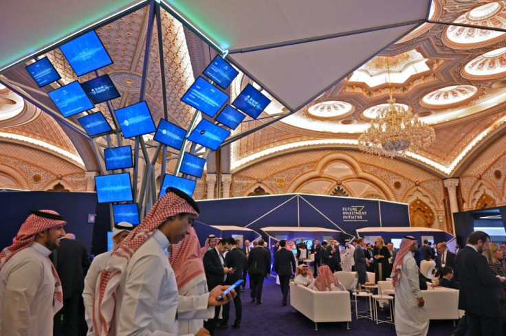 Saudi and foreign journalists covering the Future Investment Initiative (FII) forum at the King Abdulaziz Conference Centre in Saudi Arabia's capital Riyadh