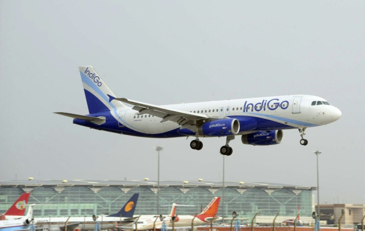 In this file photograph taken on June 24, 2010, an IndiGo Airbus A320 aircraft prepares for final approach at Indira Gandhi International Airport in New Delhi