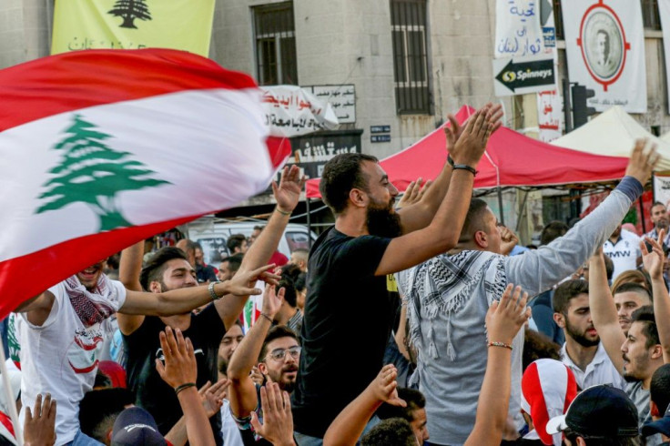 Lebanese anti-government protesters have celebrated Hariri's resignation