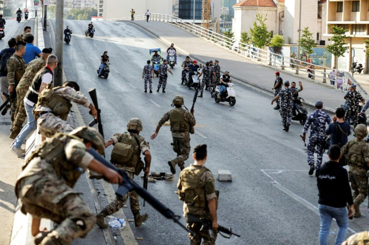 Lebanese security forces had to intervene Tuesday between clashing demonstrators and counter-protesters in central Beirut