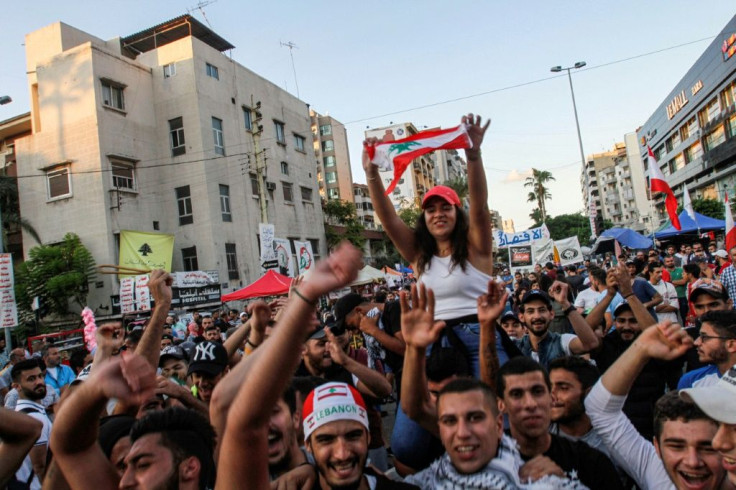 After Prime Minister Saad Hariri announced his resignation, Lebanese protesters across the country erupted in applause