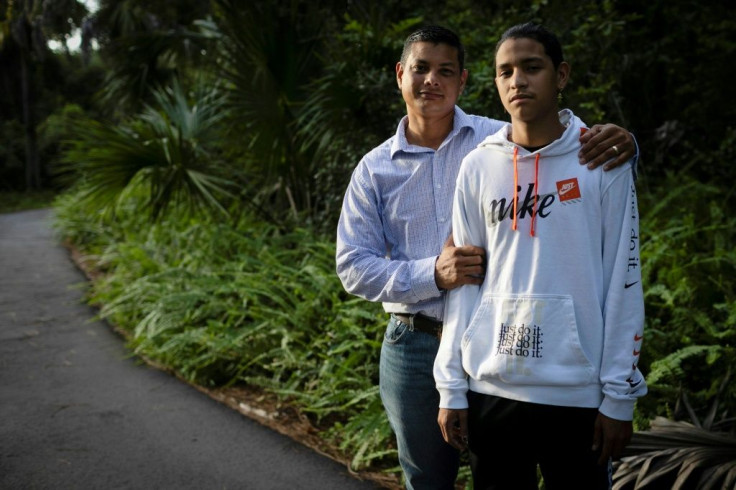 The Borges family -- Anthony (R) is seen here with his father Royer -- is suing county and school officials for not doing more to protect the students from the Parkland shooter