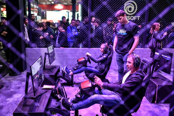 Visitors attend the 10th edition of the Paris Games week (PGW) show on October 30, 2019 at the Porte de Versailles exhibition centre in Paris.