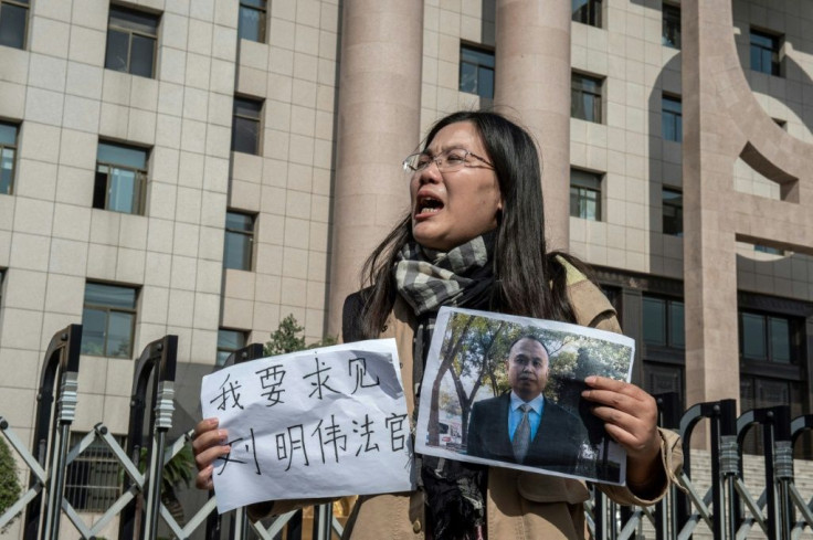 Xu Yan has travelled some 20 times from Beijing to Xuzhou in Jiangsu province in a vain struggle to get any information about Yu Wensheng