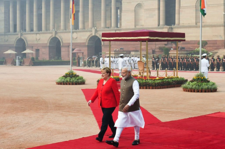 Neither Narendra Modi, nor visiting German Chancellor Angela Merkel, wore masks to protect themselves from the pollution choking Delhi
