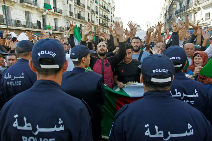Police were deployed in force, blocking protesters on an avenue leading to the Grande Poste in downtown Algiers