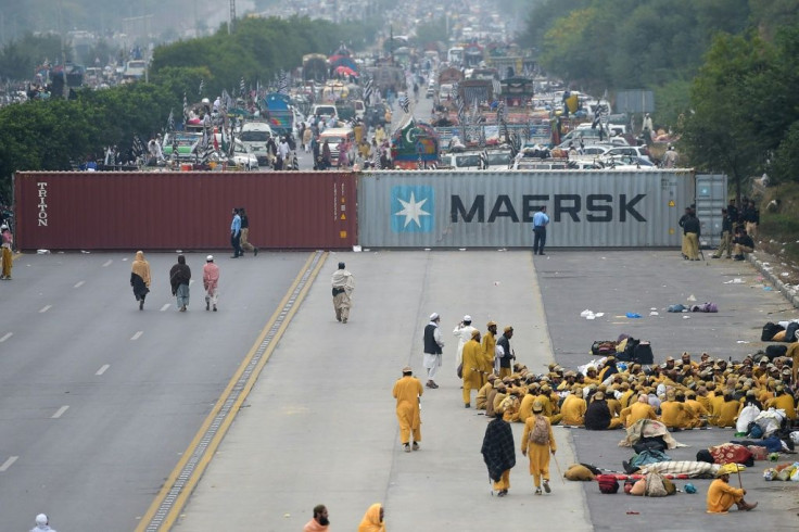 Security forces blocked entry points with shipping containers but protesters still streamed into the city