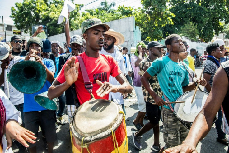 Protesters demonstrate in Port-au-Prince on October 30